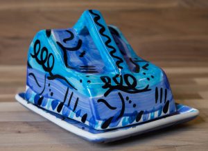 Abstract cheese dish in blue