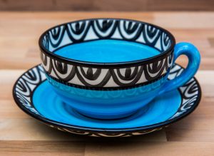 Aztec cup and saucer in bright blue