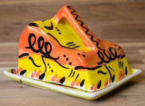 Abstract cheese dish in yellow