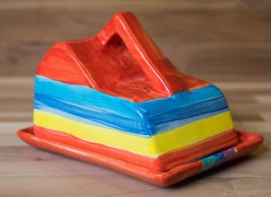 Horizontal Stripey cheese dish in Red