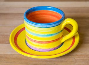Horizontal stripey small cup and saucer in Yellow