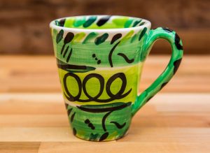Abstract large tapered mug in green