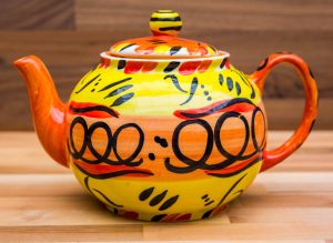 Abstract medium teapot in yellow