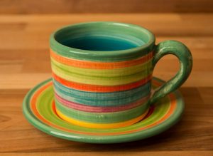 Horizontal stripey small cup and saucer in Green