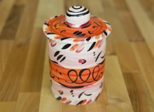 Abstract storage jar in red