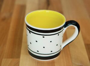 Black and white wide mug in polka dot