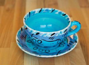 Abstract cup and saucer in blue