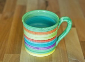 Horizontal stripey wide parallel mug in green