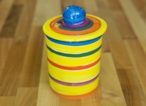 horizontal stripey storage jar in yellow