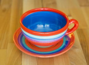 horizontal stripey cup and saucer in red