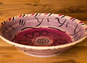 Abstract salad/fruit bowl in purple