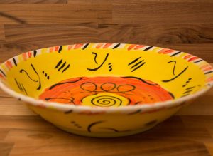 Abstract salad/fruit bowl in yellow